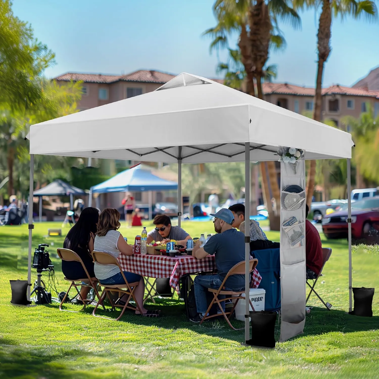 PHI VILLA 10’x10’ Pop Up Canopy Tent - One Push Setup, Instant Shade Tent with Vented Roof for Beach & Events - Includes Storage Bag, Sandbags, Stakes & Ropes (White)